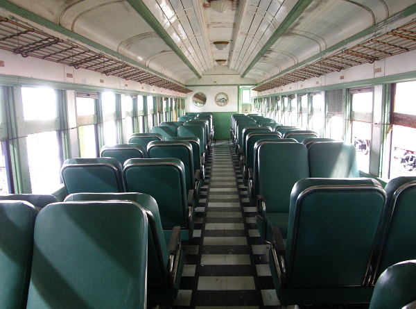 Vintage black, white, and teal passenger car.