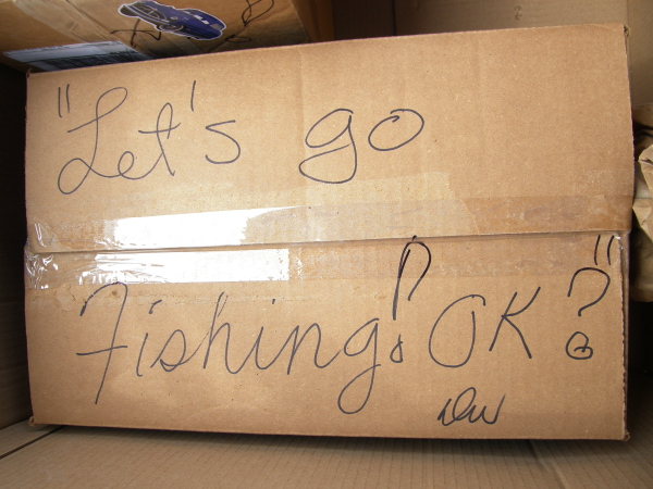 Let's go fishing! Ok? written on a box.