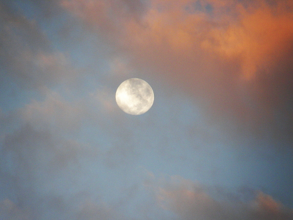 Full moon at sun rise