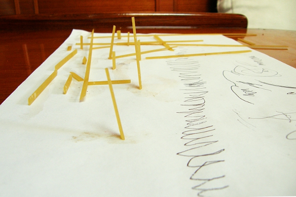 Child's macaroni art - using fettuccine instead.