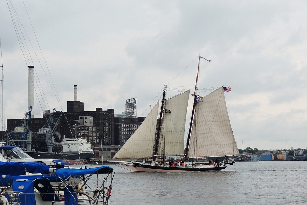 Schooner Lady Maryland sailing through Baltimore harbor.