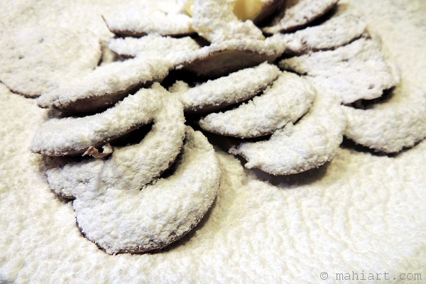 Dutch snack called poffertjes, covered in powder sugar