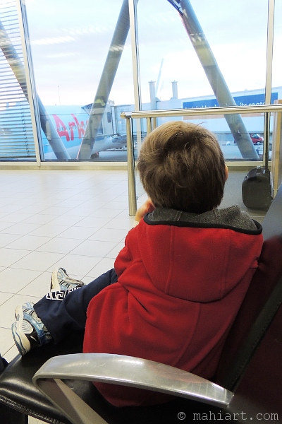 Boy waiting for plane