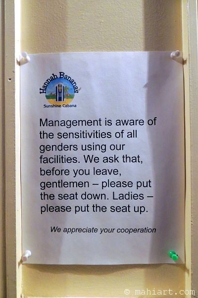 Notice posted by the unisex restrooms at Hannah Banana's