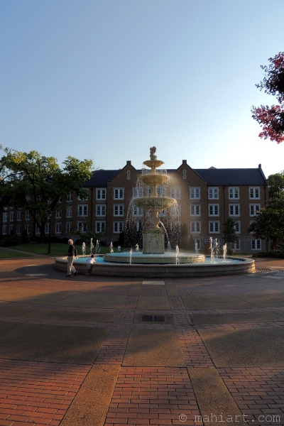 UNA fountain at sunset