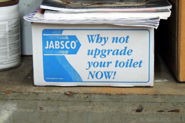 Jabsco box with slogan Why not upgrade your toilet NOW!
